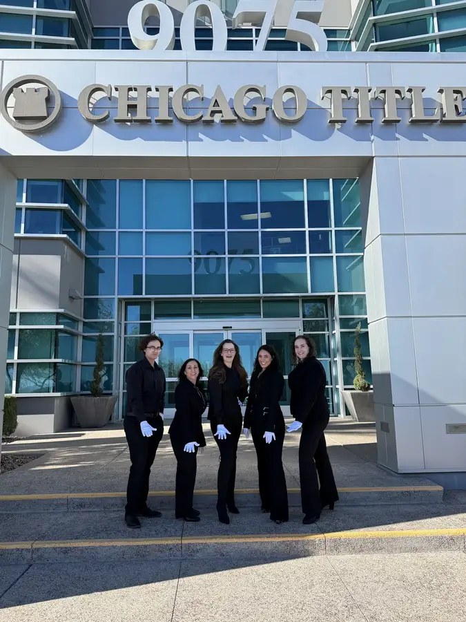 Team outside the Chicago Title building